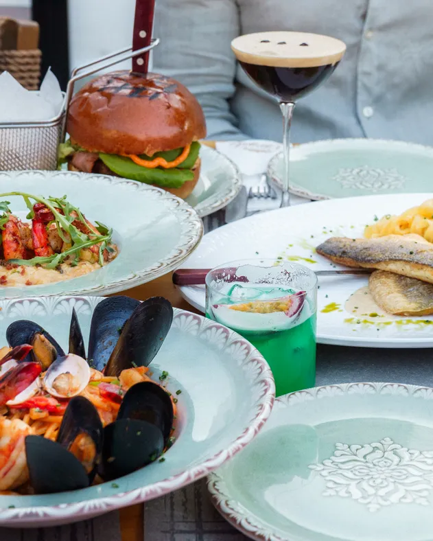 Burger, seafood pasta, and grilled fish at d'angelo